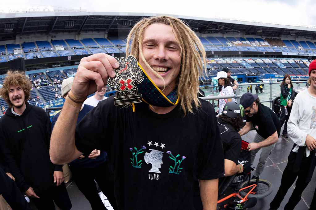 Boyd Hiler Federal bmx rider winning gold medal at x games holding up his medal