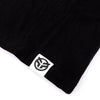 Black t-shirt with a white logo on a white background