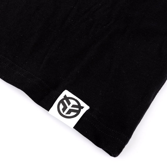Black t-shirt with a white logo on a white background